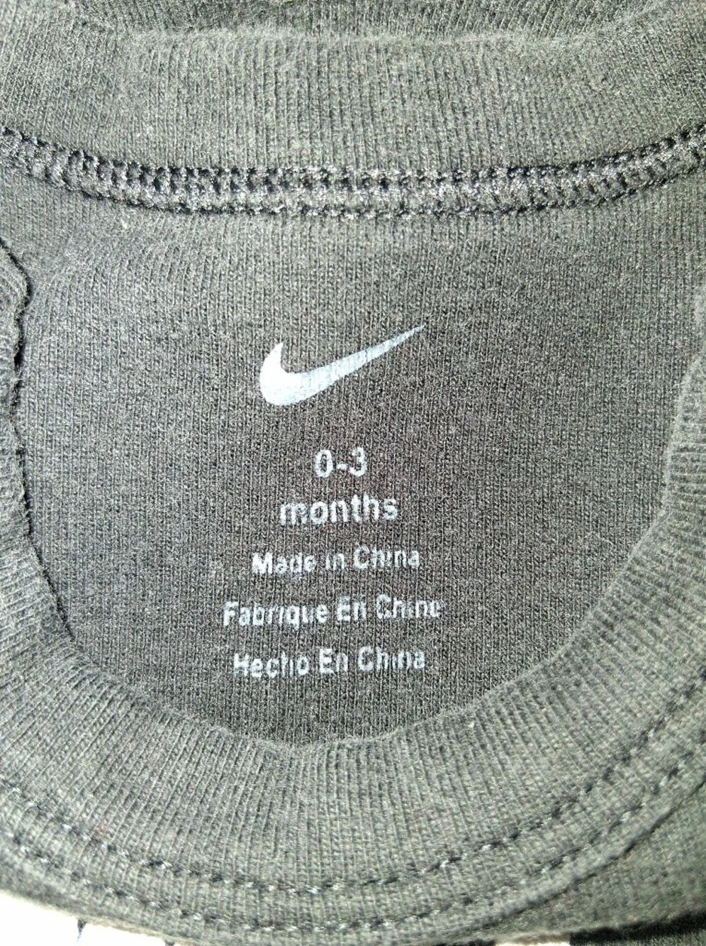 Nike Black Baby Bodysuit with Red Swoosh